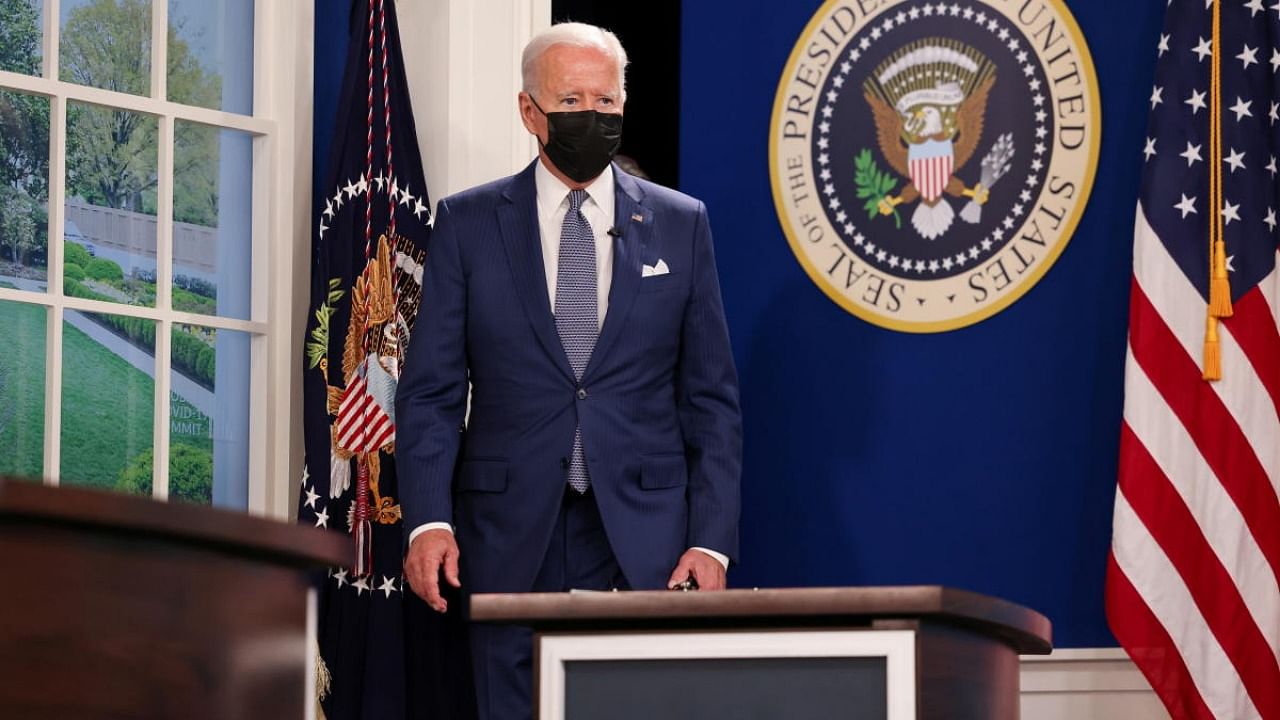 US President Joe Biden enters a virtual Covid-19 Summit as part of the United Nations General Assembly (UNGA) from the South Court Auditorium in the White House complex. Credit: Reuters photo