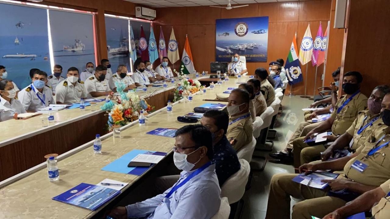 Stateholders take part in a workshop on Maritime search and rescue operation organised by Indian Coast Guard in Mangaluru on Thursday. Credit: Special arrangement