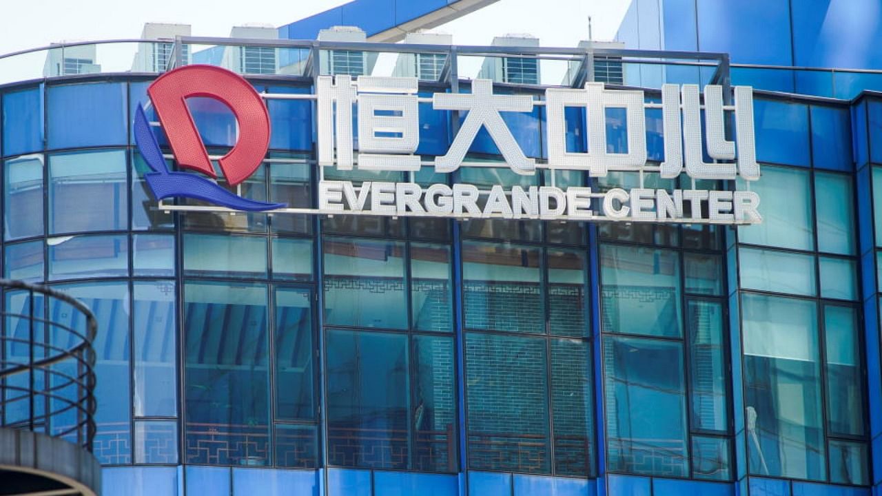 The logo of China Evergrande Group seen on the Evergrande Center in Shanghai, China September 22, 2021. Credit: Reuters photo