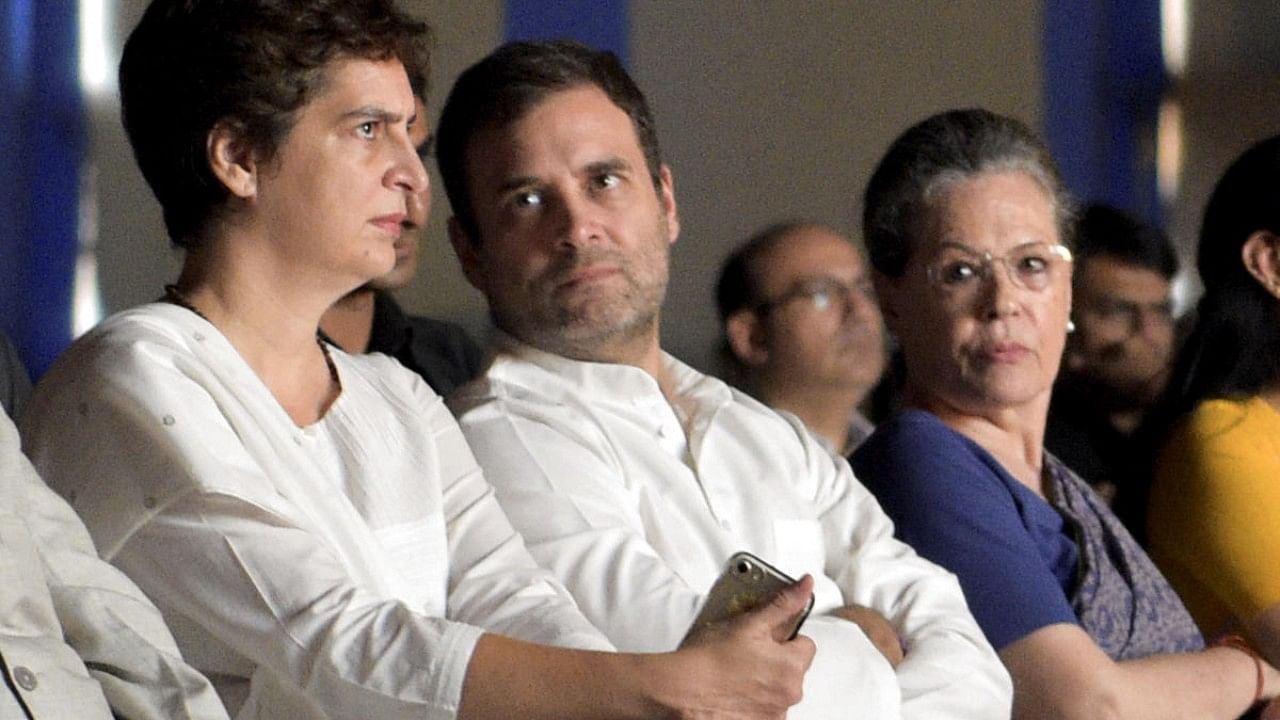 Priyanka Gandhi Vadra (L), Rahul Gandhi, and Sonia Gandhi (R). Credit: PTI File Photo