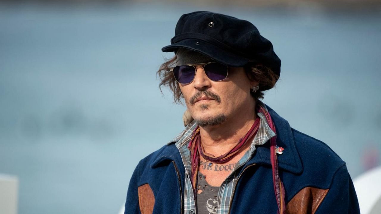 US actor Johnny Depp poses during a photocall few hours before receiving the Donostia Award for his career, during the 69th San Sebastian Film Festival in the northern Spanish Basque city of San Sebastian on September 22, 2021. Credit: AFP Photo