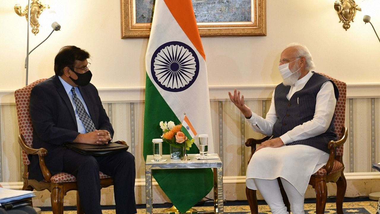 Prime Minister Narendra Modi with Chief Executive of General Atomics Global Corporation Vivek Lall. Credit: PTI Photo