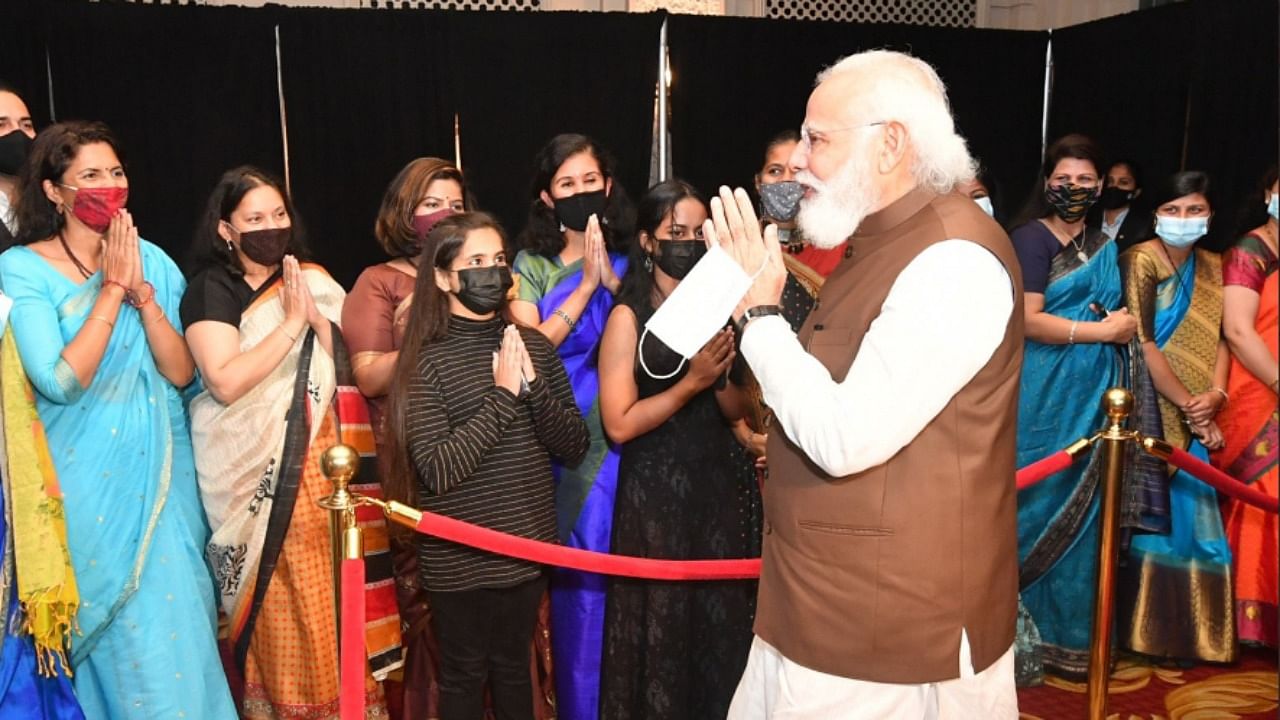 Prime Minister Narendra Modi being greeted by the Indian Community on his arrival in Washington DC, Thursday, September 23, 2021. Credit: Twitter Photo/@narendramodi