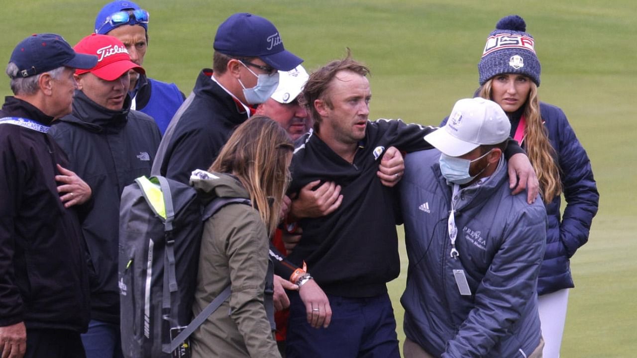 Actor Tom Felton receives medical attention during a practice round. Credit: Reuters Photo