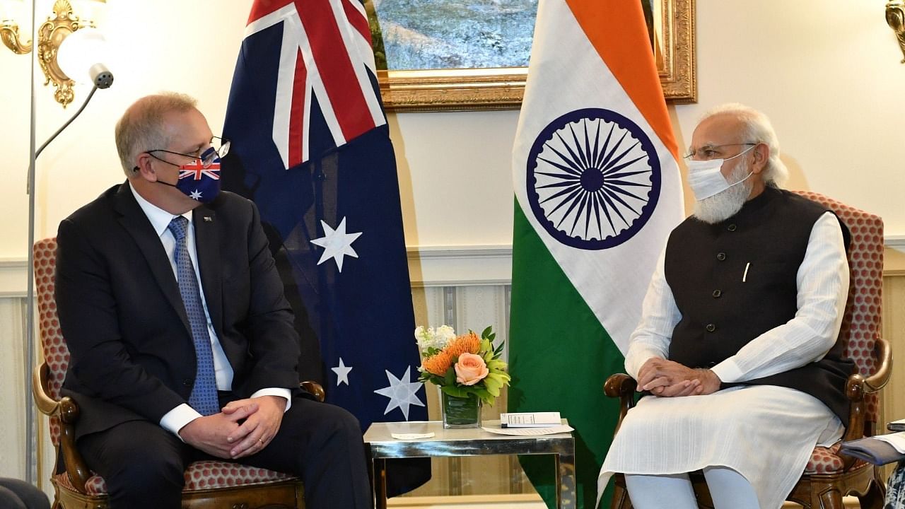 The meeting between Modi (R) and Morrison on Thursday came a week after they spoke over phone. Credit: Twitter/@narendramodi