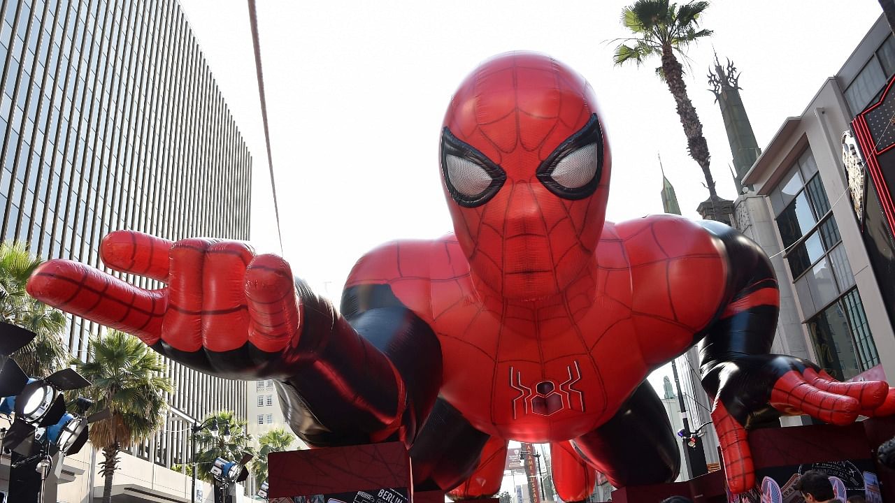In this file photo taken on June 26, 2019 a giant inflatable Spider-Man is displayed on the red carpet for the "Spider-Man: Far From Home" World premiere at the TCL Chinese theatre in Hollywood. Credit: AFP File Photo
