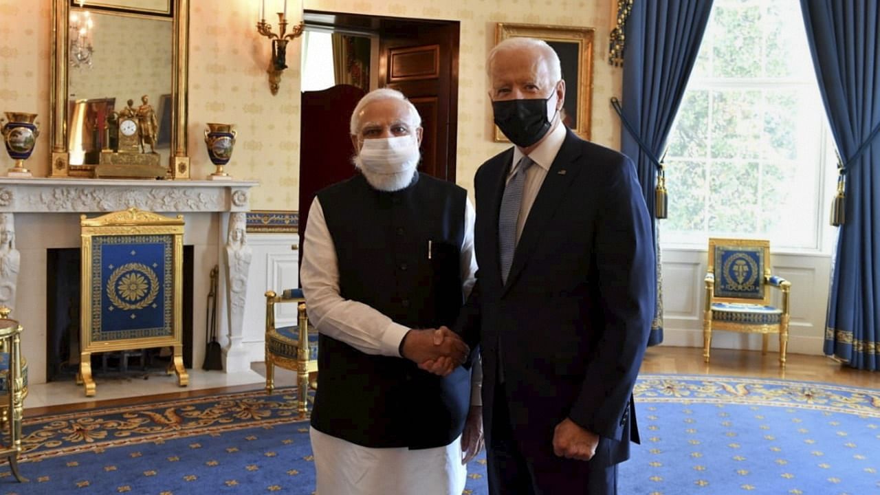 Prime Minister Narendra Modi with US President Joe Biden meets in the Oval Office of the White House, Friday. Credit: PTI Photo