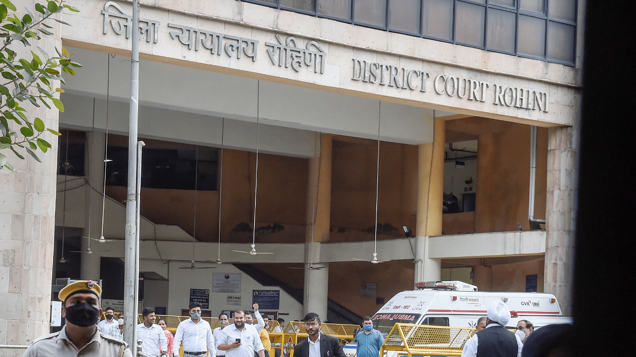 Advocates following a shootout at the Rohini Court. Credit: PTI Photo