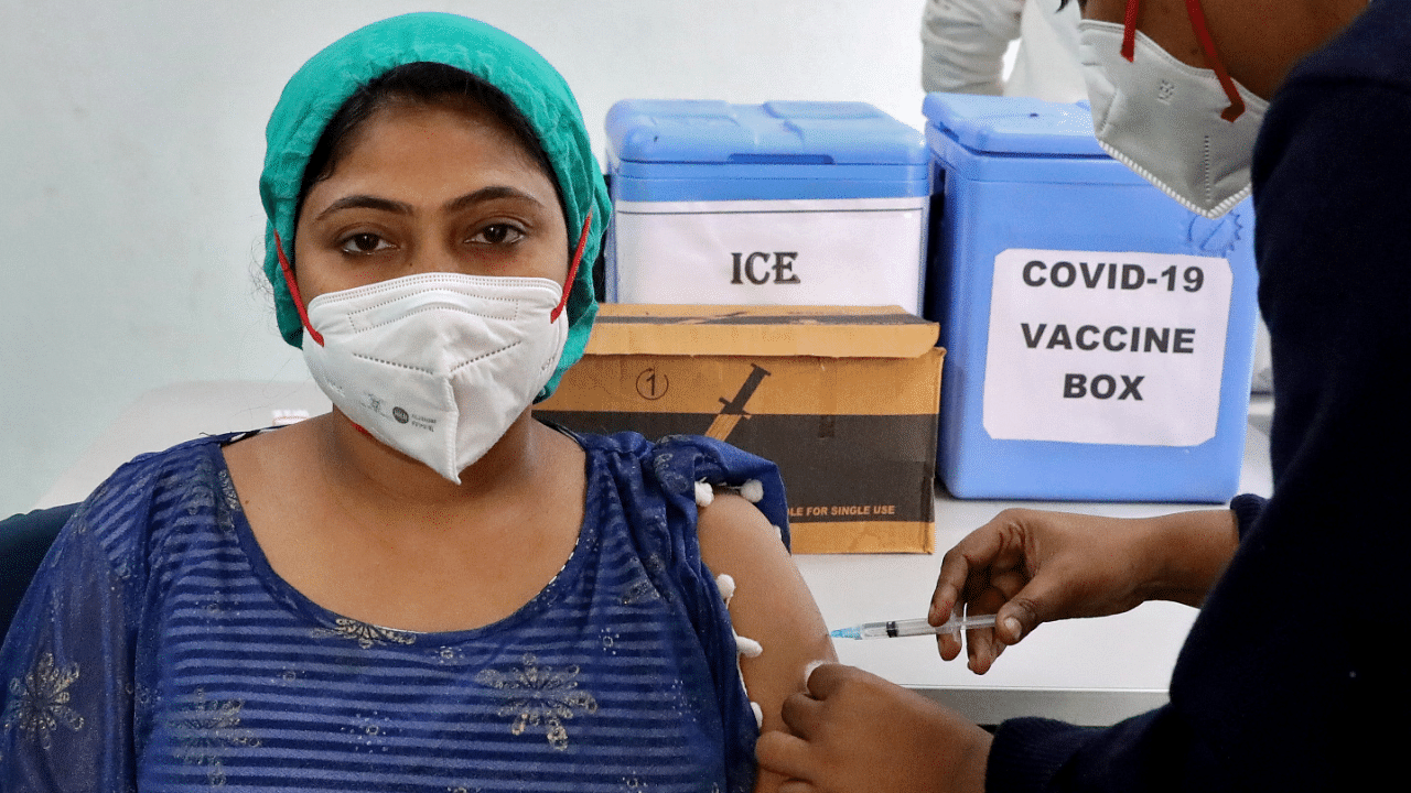 A healthcare worker receives Covid-19 vaccine Covishield. Credit: Reuters File Photo