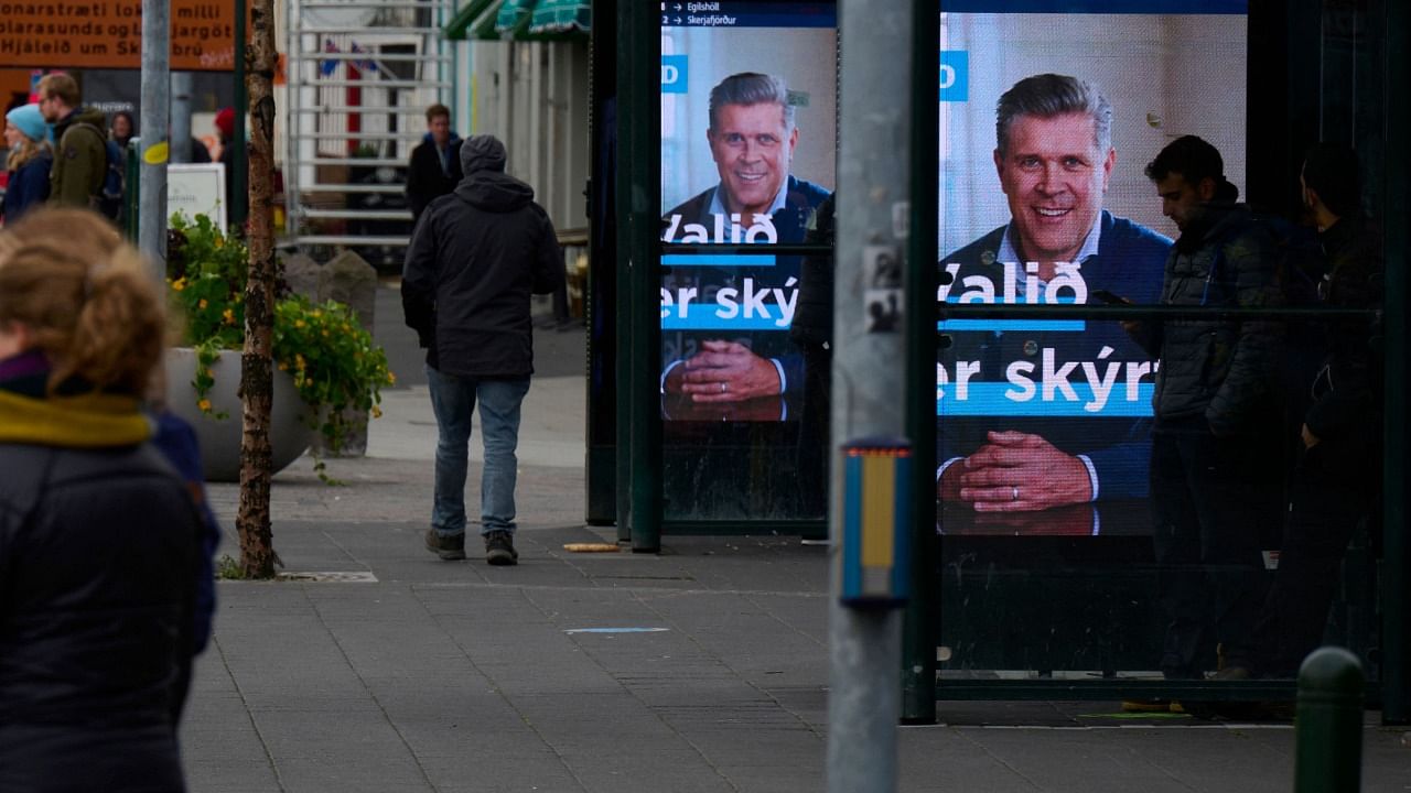 Election posters of Iceland's Finance Minister, leader and top candidate of the Icelandic Independence Party Bjarni Benediktsson are seen at a bus station in Iceland's capital Reykjavik on September 25, 2021, during the country's parliamentary elections to elect members of the Althing. Credit: AFP Photo