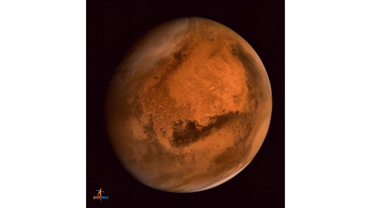 A handout photograph received from the Indian Space Research Organisation (ISRO) shows an image of the planet Mars taken by the ISRO in 2014. Credit: AFP File Photo