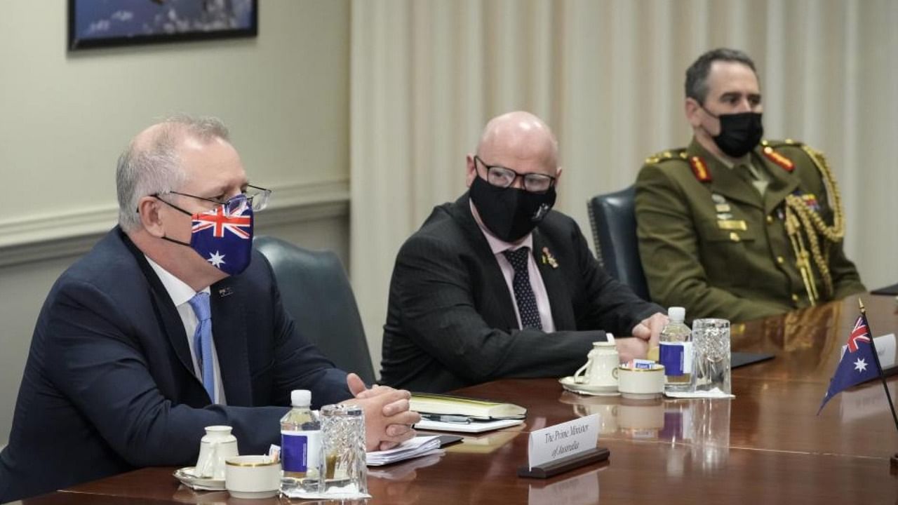 Prime Minister of Australia Scott Morrison and US Secretary of Defense Lloyd Austin. Credit: AFP File Photo
