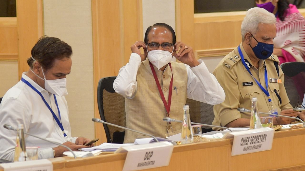 MP CM Shivraj Singh Chouhan during a high-level meeting chaired by Union Home Minister Amit Shah (unseen) with Chief Ministers of ten Naxal-hit states, at Vigyan Bhawan in New Delhi. Credit: PTI Photo