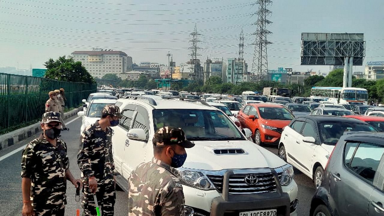 Heavy traffic jam on Delhi- Gurugram expressway due to barricading by Delhi Police. Credit: PTI Photo