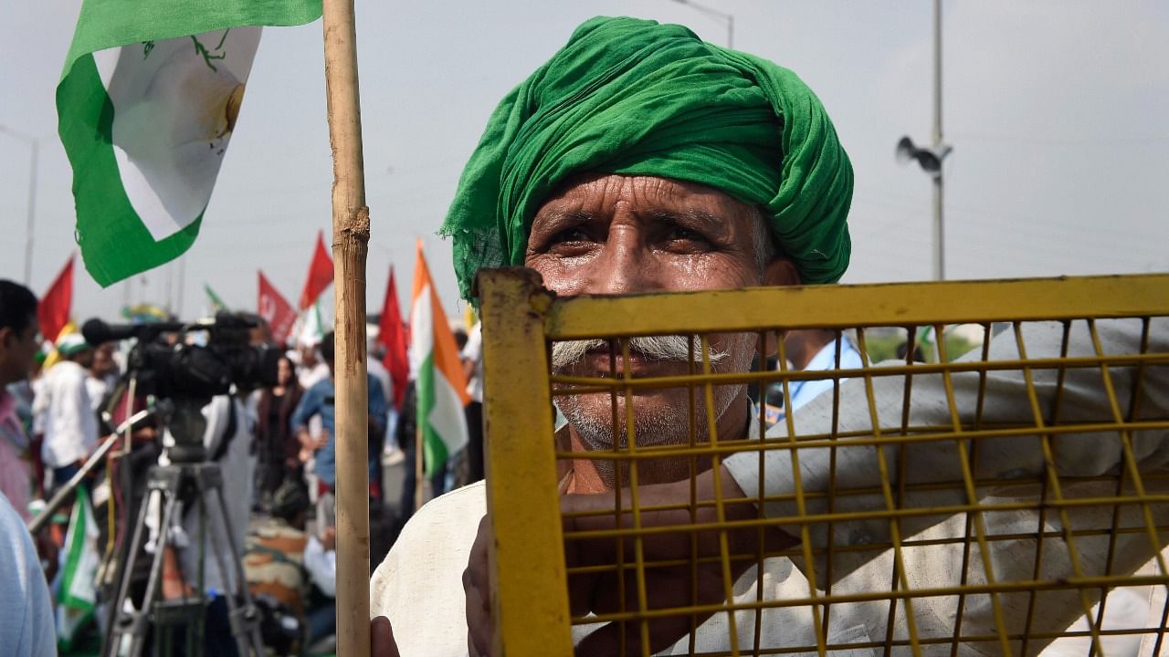 A farmer during farmers' 'Bharat Bandh' against central government's three farm reform laws. Credit: PTI Photo