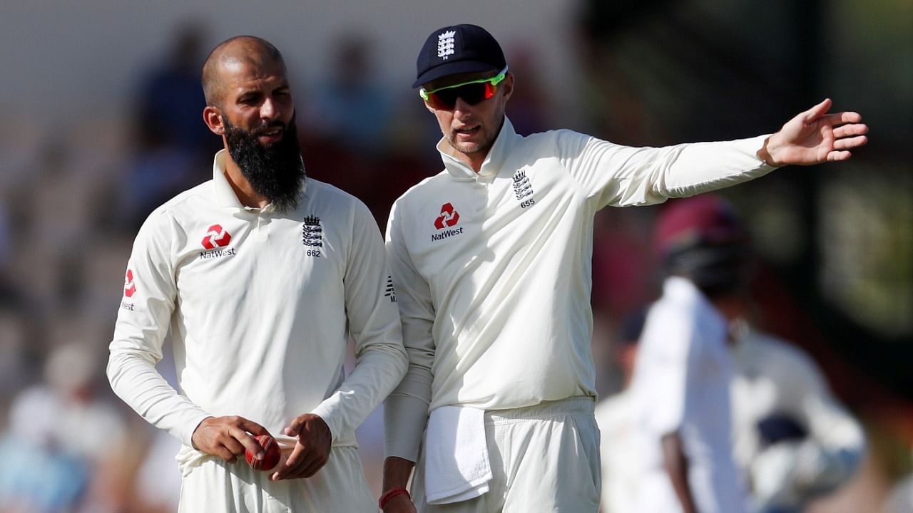Moeen Ali alongside England Test skipper Joe Root. Credit: Reuters File Photo