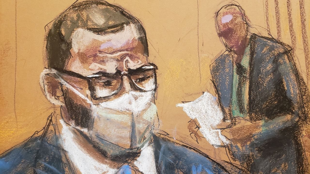 R Kelly sits as the jury foreman reads the guilty verdict in Kelly's sex abuse trial at Brooklyn's Federal District Court in a courtroom sketch in New York, US. Credit: Reuters Photo