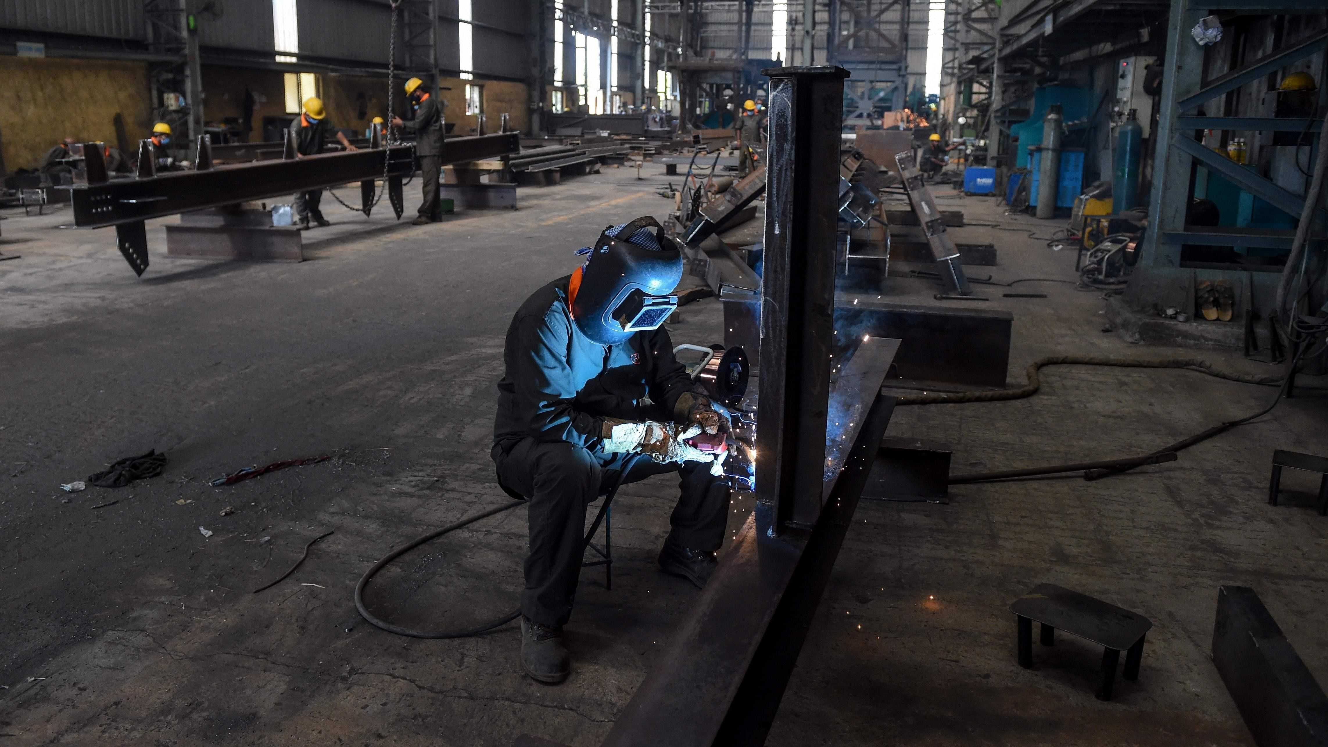  The manufacturing sector saw the highest decrease of 14.2 lakh in employees. Credit: AFP File Photo