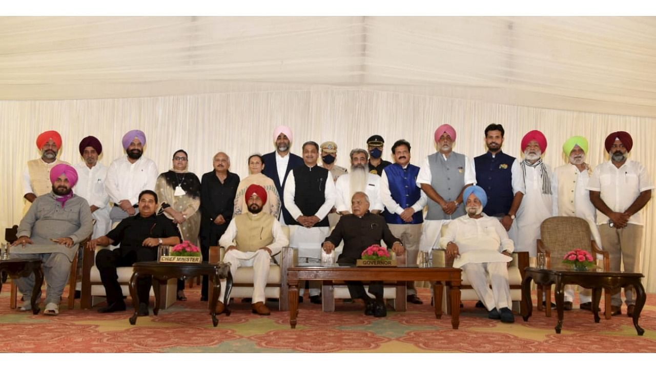 Punjab's new Chief Minister Charanjit Singh Channi with his Cabinet after the oath-taking ceremony in Chandigarh. Credit: PTI Photo