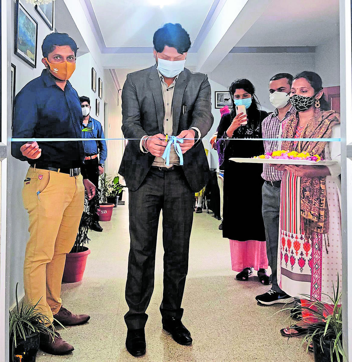 Assistant Commissioner and tourism department in charge deputy director Iswar Kumar Kandoo inaugurates a drawing competition and exhibition organised as a part of World Tourism Day in Madikeri.