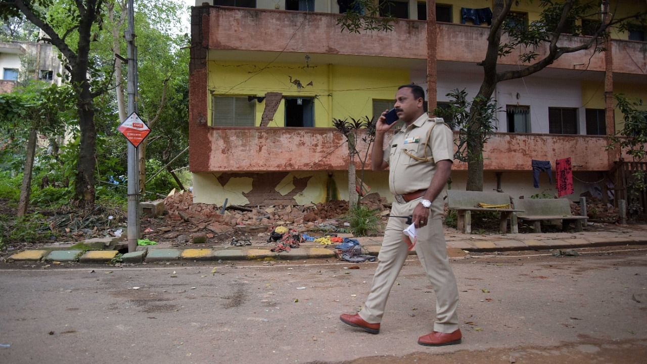 A part of staff quarters of Bangalore Milk Union Limited (BAMUL) collapsed at Dairy Circle in Bengaluru on Tuesday, September 28, 2021. Credit: DH Photo