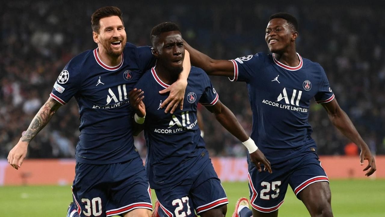 Paris Saint-Germain's Lionel Messi, Idrissa Gana Gueye, Nuno Mendes celebrate after scoring a goal. Credit: AFP Photo 