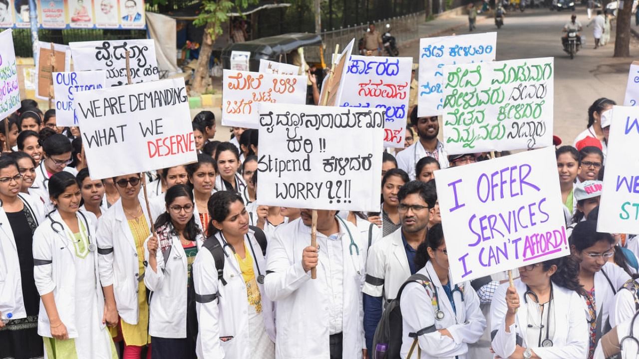 File Photo of JJM Medical College's students protesting over non-payment of stipend.  Credit: DH File Photo