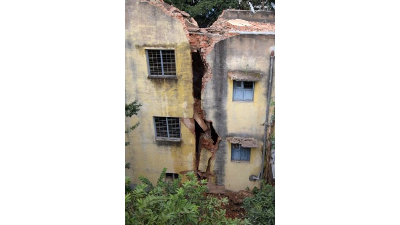 A part of the staff quarters of the Bangalore Milk Union Limited (BAMUL) which collapsed at Dairy Circle in Bengaluru on Tuesday, September 28, 2021. Credit: DH Photo