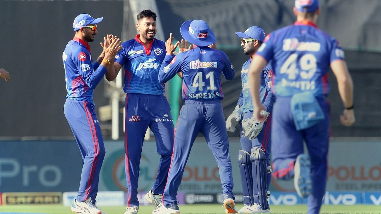 Delhi Capitals players on field celebrating a wicket. Credit: PTI File Photo