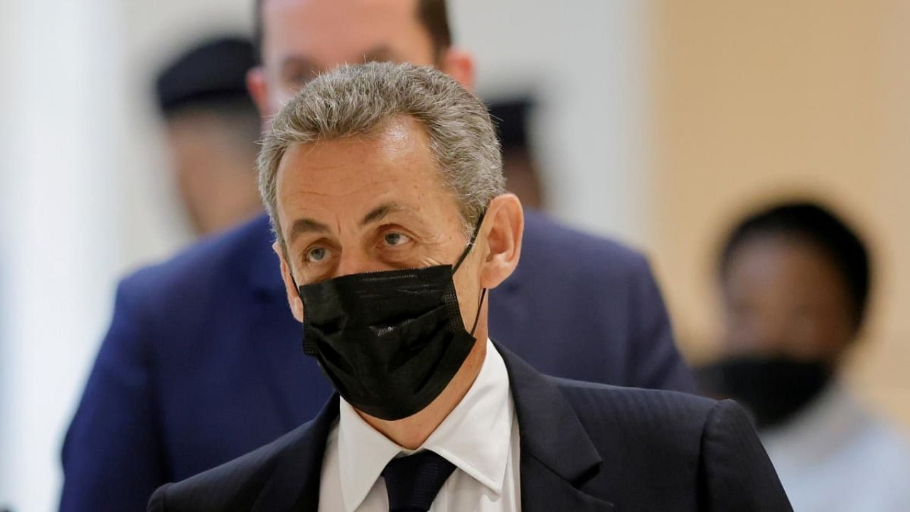 Former French President Nicolas Sarkozy arrives for a hearing in a trial over alleged illegal financing of his failed re-election campaign in 2012, with 13 other defendants, former officials of Bygmalion and representatives of the UMP, at the courthouse in Paris. Credit: Reuters photo