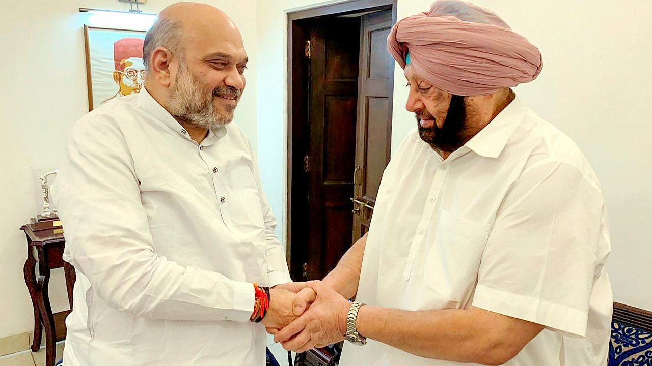 Home Minister Amit Shah meets with Punjab Chief Minister Capt Amarinder Singh, in New Delhi. Credit: PTI Photo