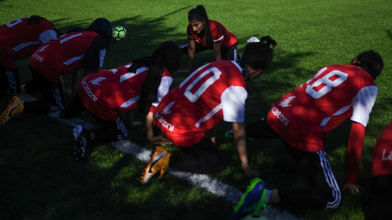 Players of Afghanistan national women football team attend to a training session at Odivelas, outskirts of Lisbon. Credit: AFP Photo