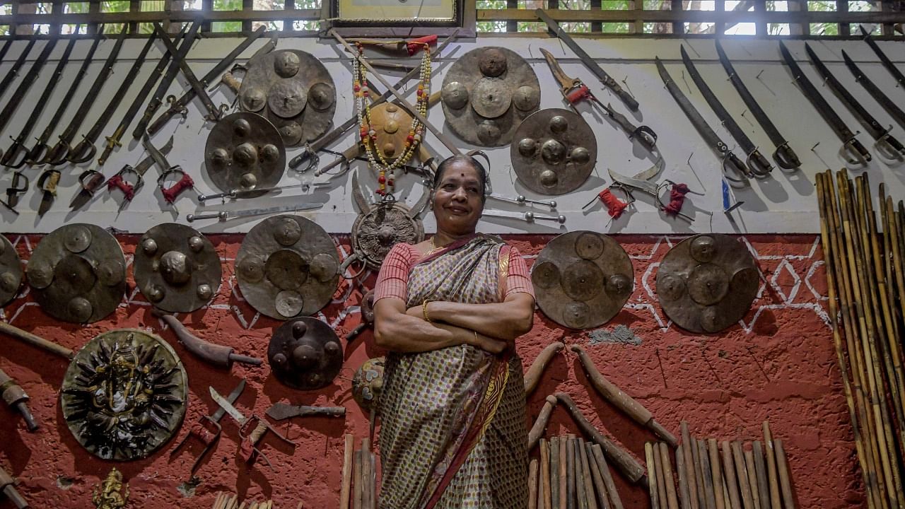 Meenakshi Amma practitioner and teacher of 'Kalaripayattu', a traditional martial art originated in Kerala. Credit: AFP Photo