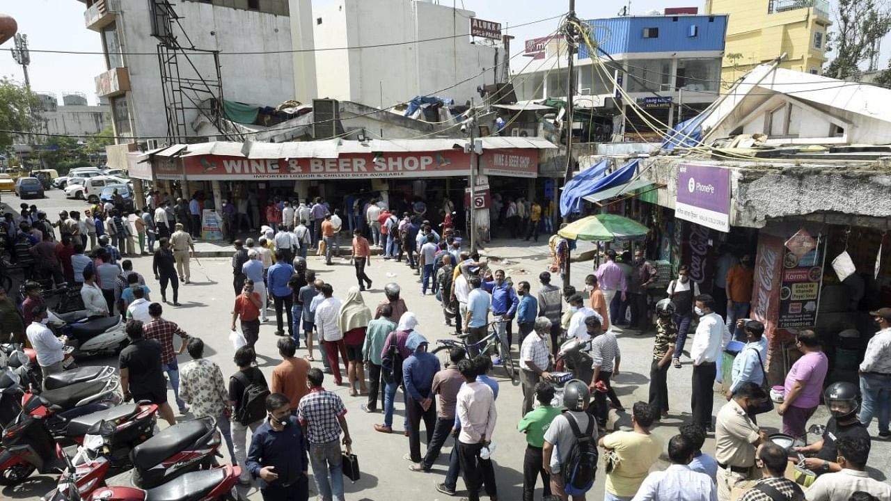 Delhi government runs about 60 per cent of the 850 alcohol stores in the city. Credit: PTI Photo