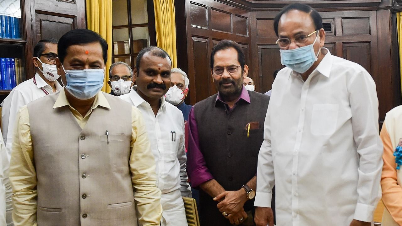 Union Ministers Sarbananda Sonowal and L Murugan with Union Minority Affairs Minister Mukhtar Abbas Naqvi and Chairman of Rajya Sabha (RS) Venkaiah Naidu during their oath taking ceremony as RS members. Credit: PTI Photo