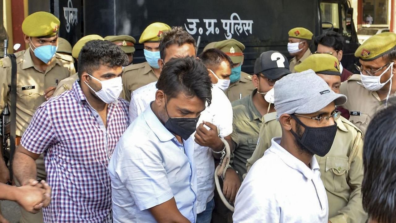 Police produce journalist Siddique Kappan and three others, suspected to have links with the Popular Front of India and its affiliate in Mathura, to a court in Mathura. Credit: PTI file photo