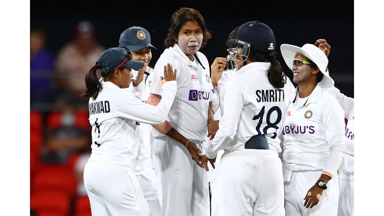 Team India celebrate taking a wicket. Credit: Twitter/@BCCIWomen