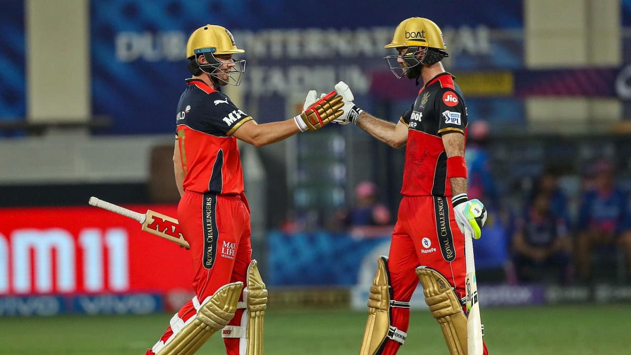 AB de Villiers and Glenn Maxwell of Royal Challengers Bangalore. Credit: PTI File Photo