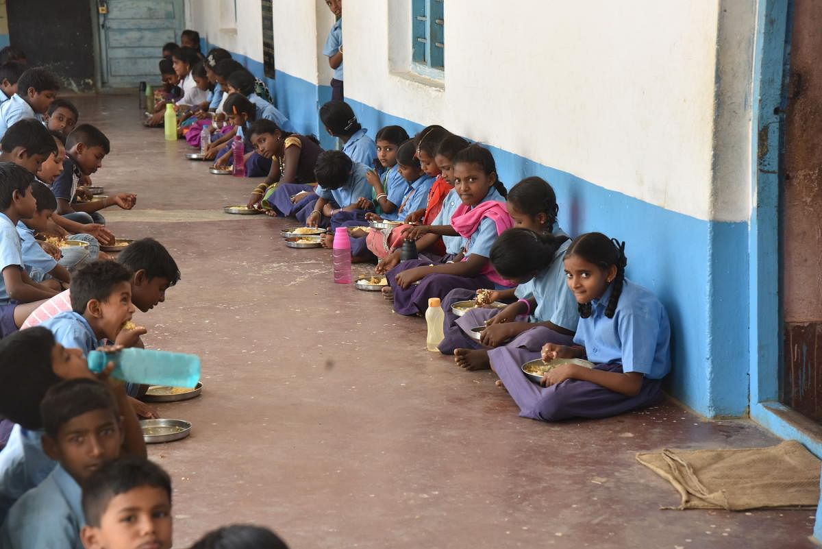 For the academic year 2020-21 ration was distributed to children for 240 days to compensate for cooked food. Credit: DH File Photo