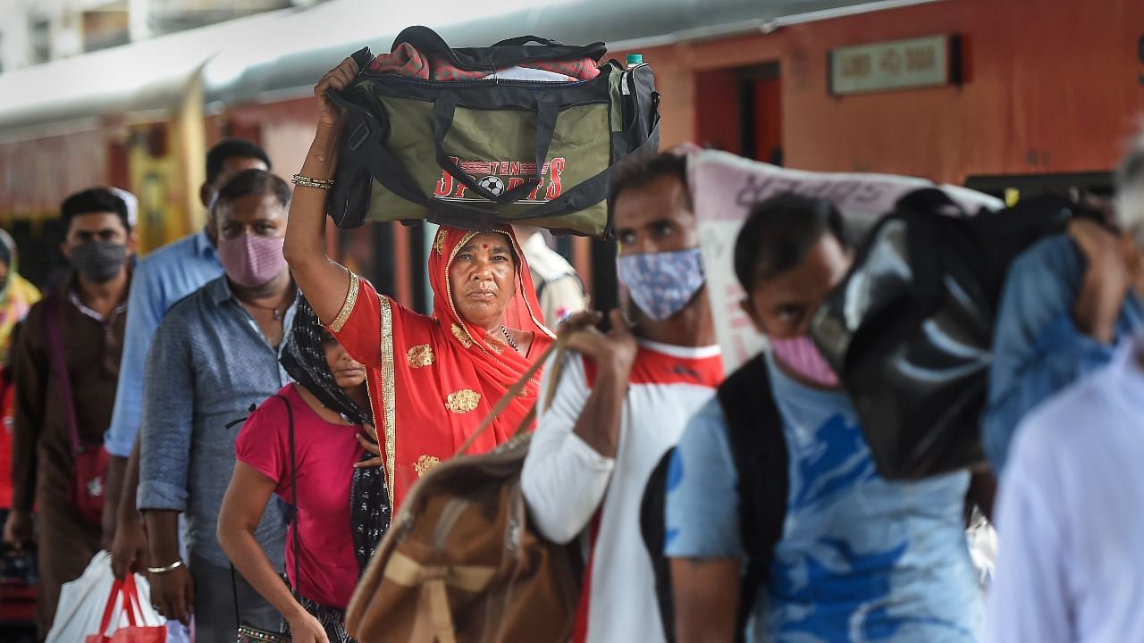 Travellers wait in a queue to get tested for Covid-19, at a railway station in Mumbai, Thursday, September 30, 2021. Credit: PTI Photo