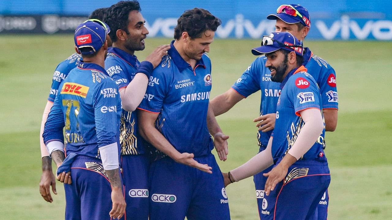 Mumbai Indians players celebrate a wicket against Delhi Capitals. Credit: PTI File Photo
