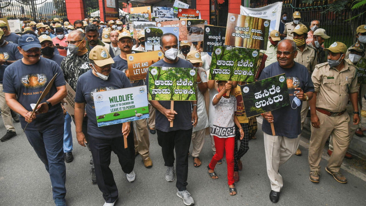 Forest Minister Umesh Katti, Bangalore Central MP PC Mohan and senior forest officials take part in 67th Wildlife Week walkathon in Bengaluru. Credit: DH Photo