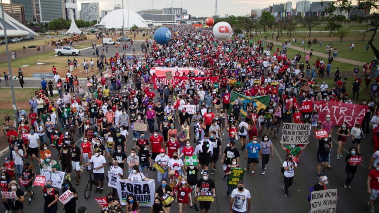 Demonstrators protest against far-right President Jair Bolsonaro's administration in Brasilia. Credit: Reuters Photo