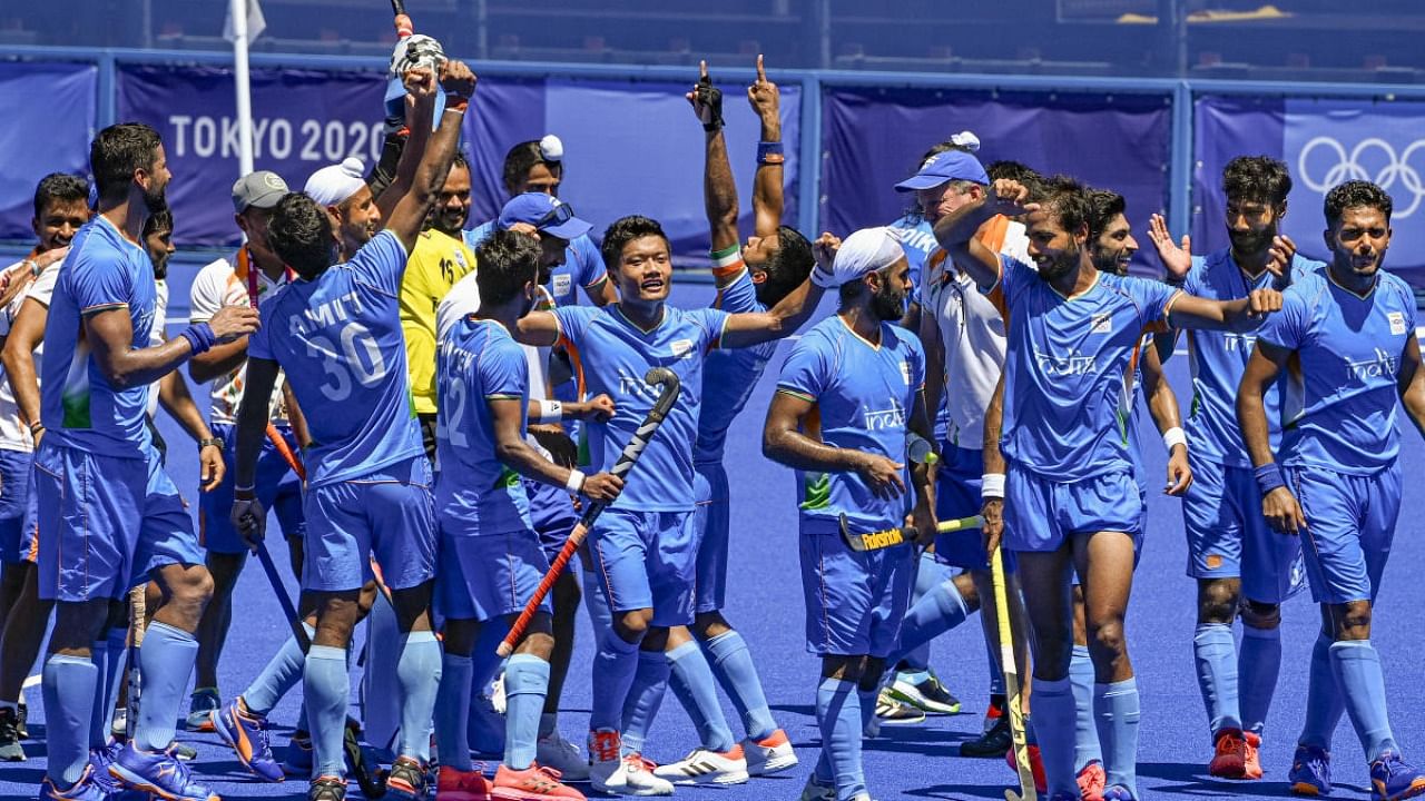 Indian players celebrate their victory over Germany in the men's field hockey bronze medal match, at the 2020 Summer Olympics, in Tokyo. Credit: PTI File Photo