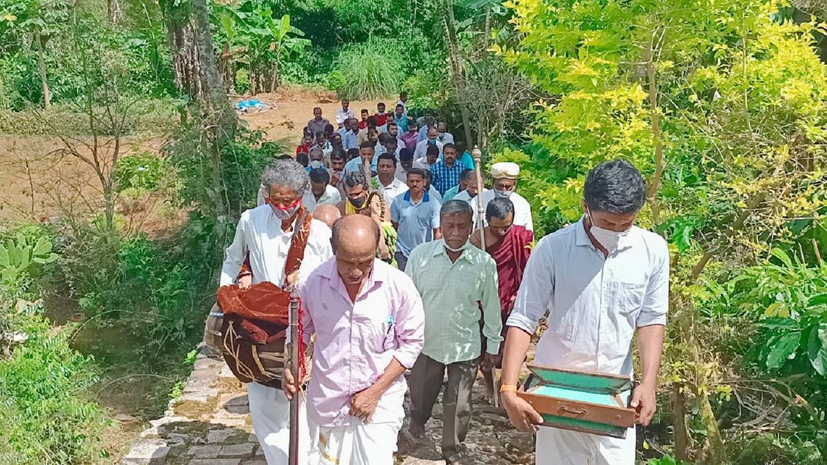 Devotees take part in a procession to Bhagamandala, on the occasion of ‘Ajna Muhurtha’ on Monday.