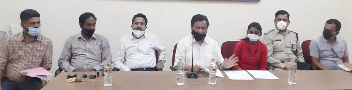 MLA K G Bopaiah speaks at a preparatory meeting organised by Kaveri Dasara Samiti in Gonikoppa.