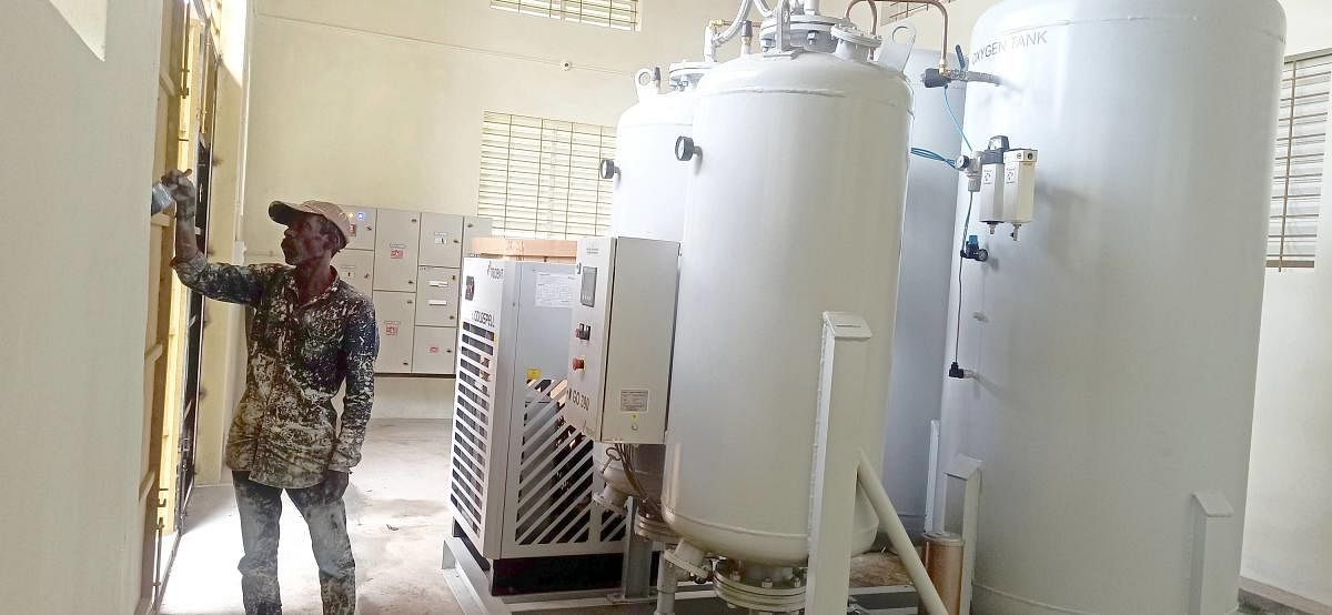 The final works at the oxygen generation unit in progress at Somwarpet government hospital.