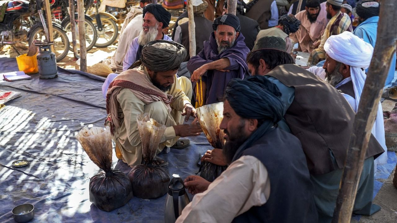 An opium market in Afghanistan. Credit: AFP Photo
