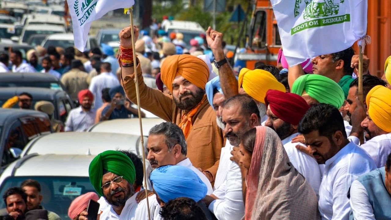 Congress leader Navjot Singh Sidhu with supporters, marches towards Uttar Pradesh’s Lakhimpur Kheri district. Credit: PTI Photo