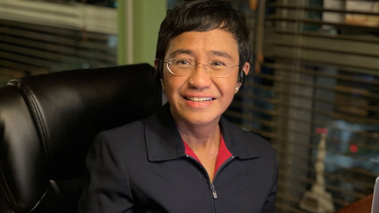 Filipino journalist and 2021 Nobel Peace Prize winner Maria Ressa sits by the desk at her home in Manila, Philippines, October 8, 2021. Credit: Reuters Photo